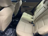 Kia Sportage full-option model with a panoramic sunroof and 2.0L