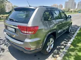 2012 Jeep Grand Cherokee — only 73,000 km.