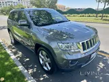 2012 Jeep Grand Cherokee — only 73,000 km.