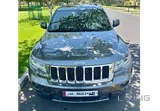 2012 Jeep Grand Cherokee — only 73,000 km.