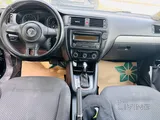 2012 model Black Volkswagen Jetta sale for QR 12500