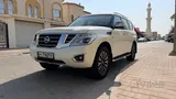 نيسان باترول 2014 - سيارة مستعملة بيضاء بناقل حركة أوتوماتيكي