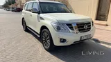 نيسان باترول 2014 - سيارة مستعملة بيضاء بناقل حركة أوتوماتيكي