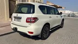 نيسان باترول 2014 - سيارة مستعملة بيضاء بناقل حركة أوتوماتيكي