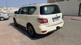 نيسان باترول 2014 - سيارة مستعملة بيضاء بناقل حركة أوتوماتيكي