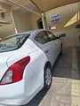 نيسان ساني 2014 - مستعملة بيضاء بنزين أوتوماتيك