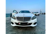 مرسيدس بنز بيضاء موديل 2014 سيدان بأربعة أبواب مع سجل خدمة كامل