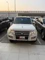 ميتسوبيشي باجيرو 2015 3.5 لتر - أبيض، 7 مقاعد، سجل خدمة كامل، السعر 33 ألف ريال قطري