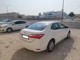 2015 white Toyota corolla
