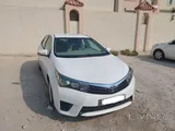 2015 white Toyota corolla