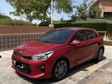 2018 Kia Rio hatchback in red