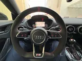 2023 Audi TTS Roadster in Tangorot Metallic (Red) with just 13,000 km