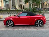 2023 Audi TTS Roadster in Tangorot Metallic (Red) with just 13,000 km