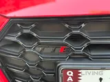 2023 Audi TTS Roadster in Tangorot Metallic (Red) with just 13,000 km