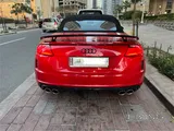 2023 Audi TTS Roadster in Tangorot Metallic (Red) with just 13,000 km