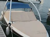 Bayliner 5.3 m boat with trailer, paid parking, and major recent service