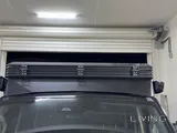 Roof tent and awning and shower tent and spare tire storage with windshield 