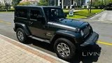 For sale beautiful jeep wrangler sahara full dealer services
