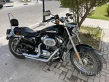 Black harley sportster 1200  with low mileage only 3k km