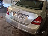 Nissan Tida 1.8L 4 Cylinder gold