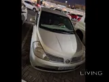 Nissan Tida 1.8L 4 Cylinder gold