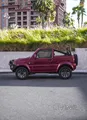 Open-air Adventure Red Suzuki Jimny