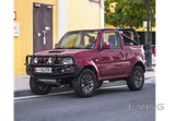 Open-air Adventure Red Suzuki Jimny