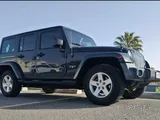 Sahara with leather seats and original touch screen