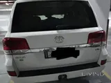 White Land cruiser good condition 